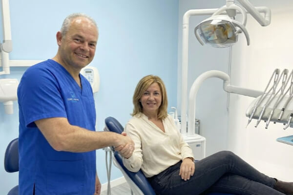 Mauro Grau with a client at the clinic